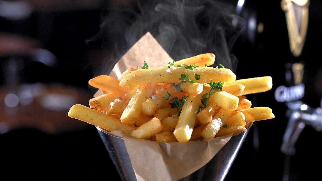 Dedicated-fryer vegan truffle fries at Emerald Loop Bar & Grill Chicago