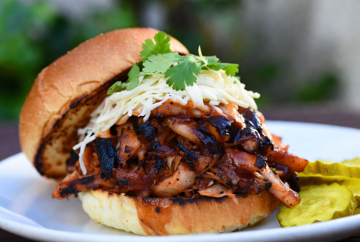Smoky plant-based jackfruit pulled pork sandwiches on pellet grill