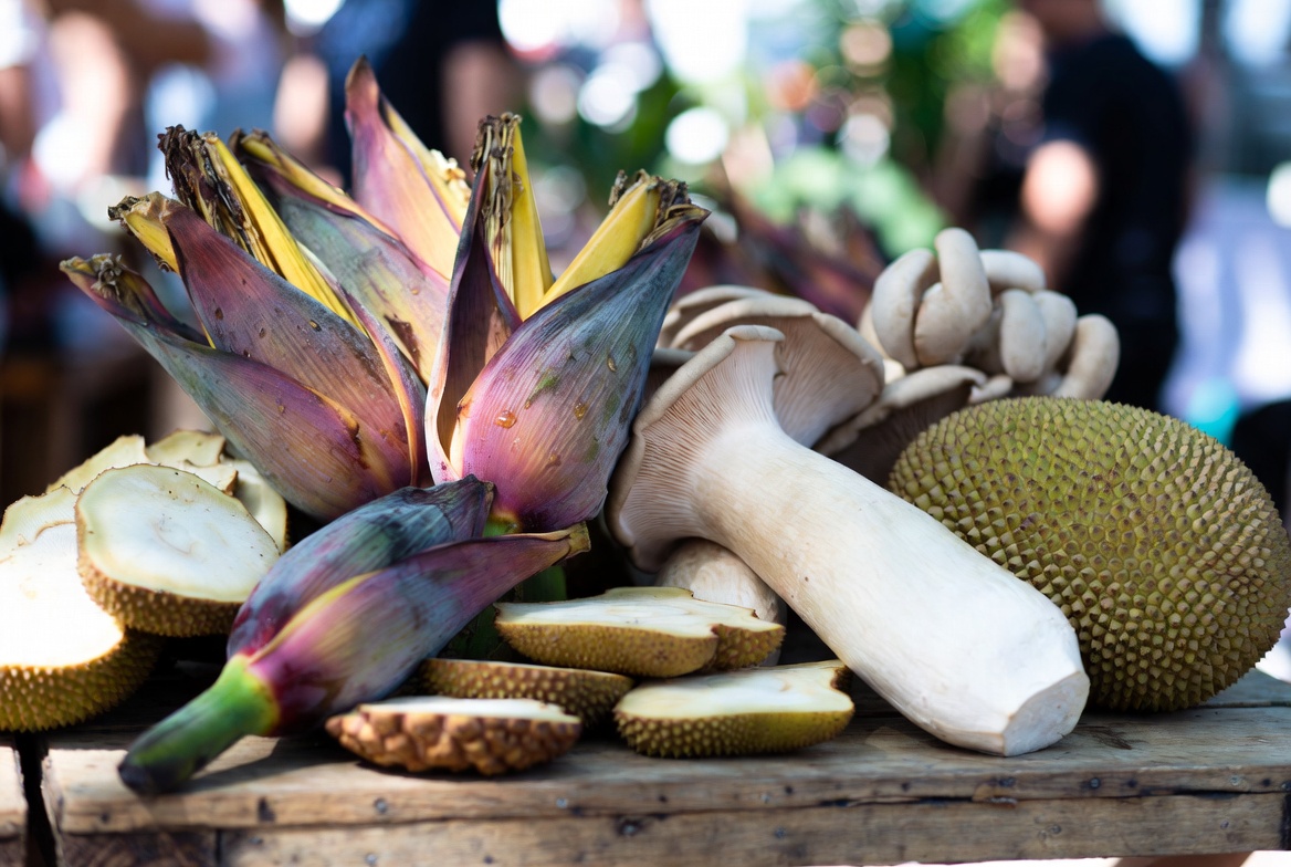 Plant-based seafood ingredients including banana blossom, king oyster mushrooms, jackfruit, and hearts of palm for healthy vegan alternatives
